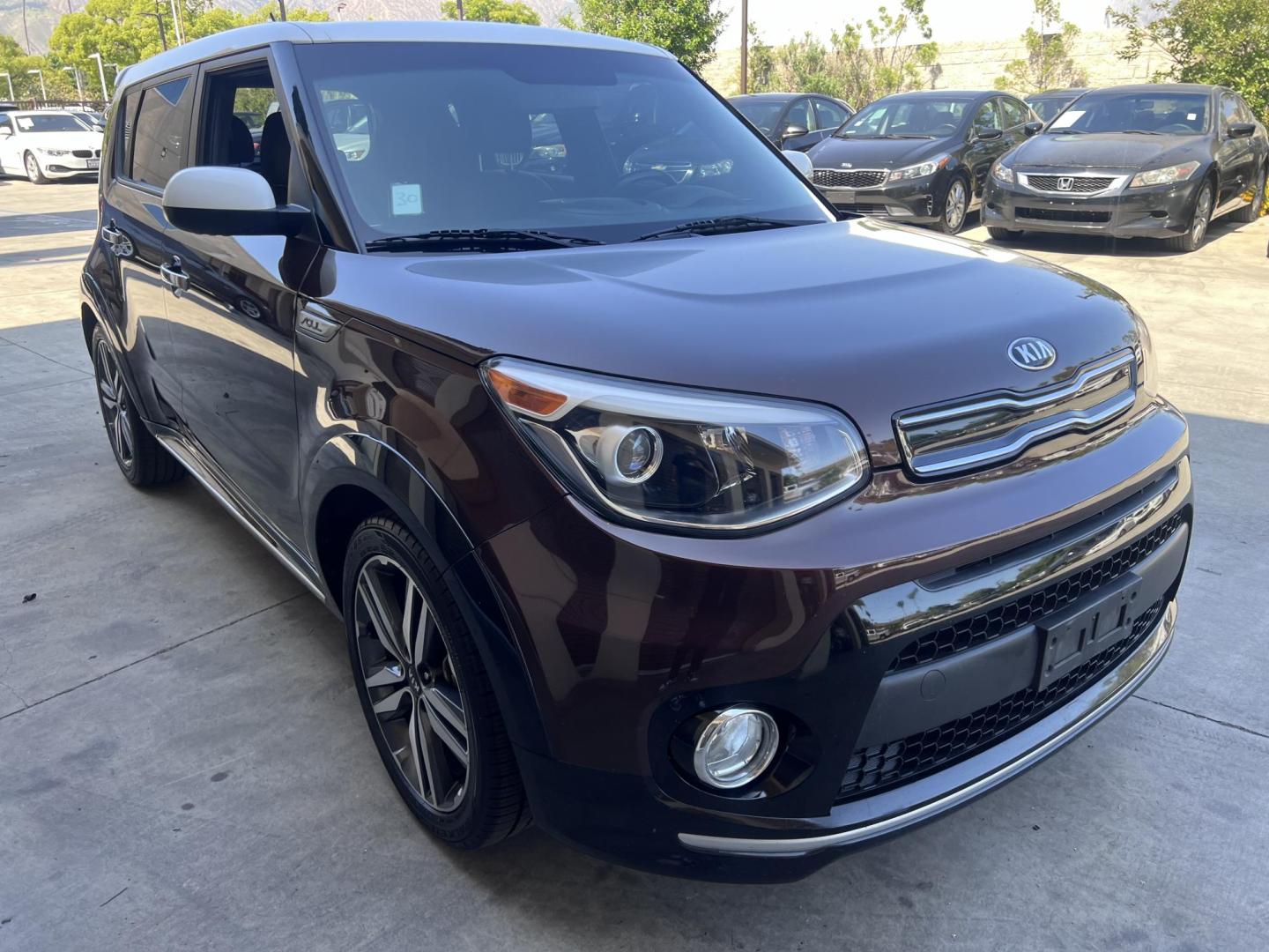 2017 Burnished Copper /Black Kia Soul + (KNDJP3A55H7) with an 2.0L L4 DOHC 16V engine, 6A transmission, located at 30 S. Berkeley Avenue, Pasadena, CA, 91107, (626) 248-7567, 34.145447, -118.109398 - 2017 Kia Soul – Two-Tone Style, Technology, and Affordable Financing – Buy Here Pay Here in Pasadena, CA Looking for a vehicle that blends stand-out design, tech features, and budget-friendly reliability? This 2017 Kia Soul is the perfect compact crossover — and it's available now at Crown - Photo#13