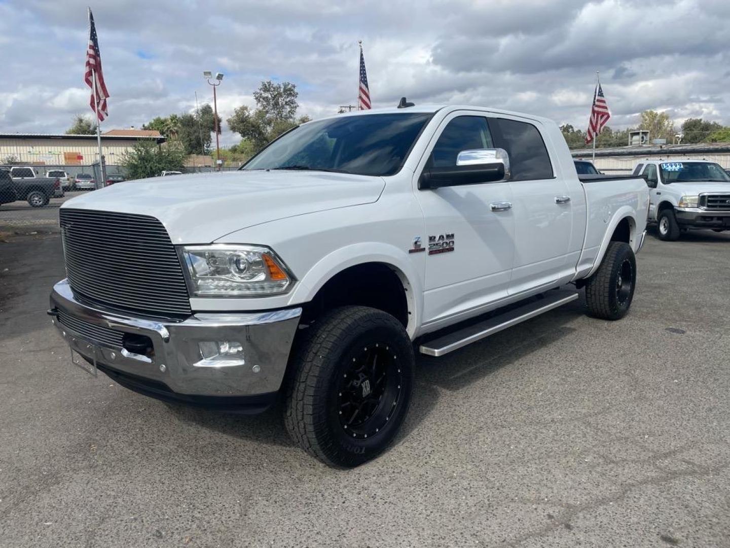 2017 Bright White Clear Coat RAM 2500 Laramie (3C6UR5NL6HG) with an 6.7L Cummins 6.7L Diesel Turbo I6 350hp 660ft. lbs. Common Rail Direct Injection engine, Automatic transmission, located at 800 Riverside Ave, Roseville, CA, 95678, 916-773-4549 & Toll Free: 866-719-4393, 38.732265, -121.291039 - CUMMINS DIESEL MEGA CAB 4X4 LARAMIE CLEAN CARFAX - Photo#0