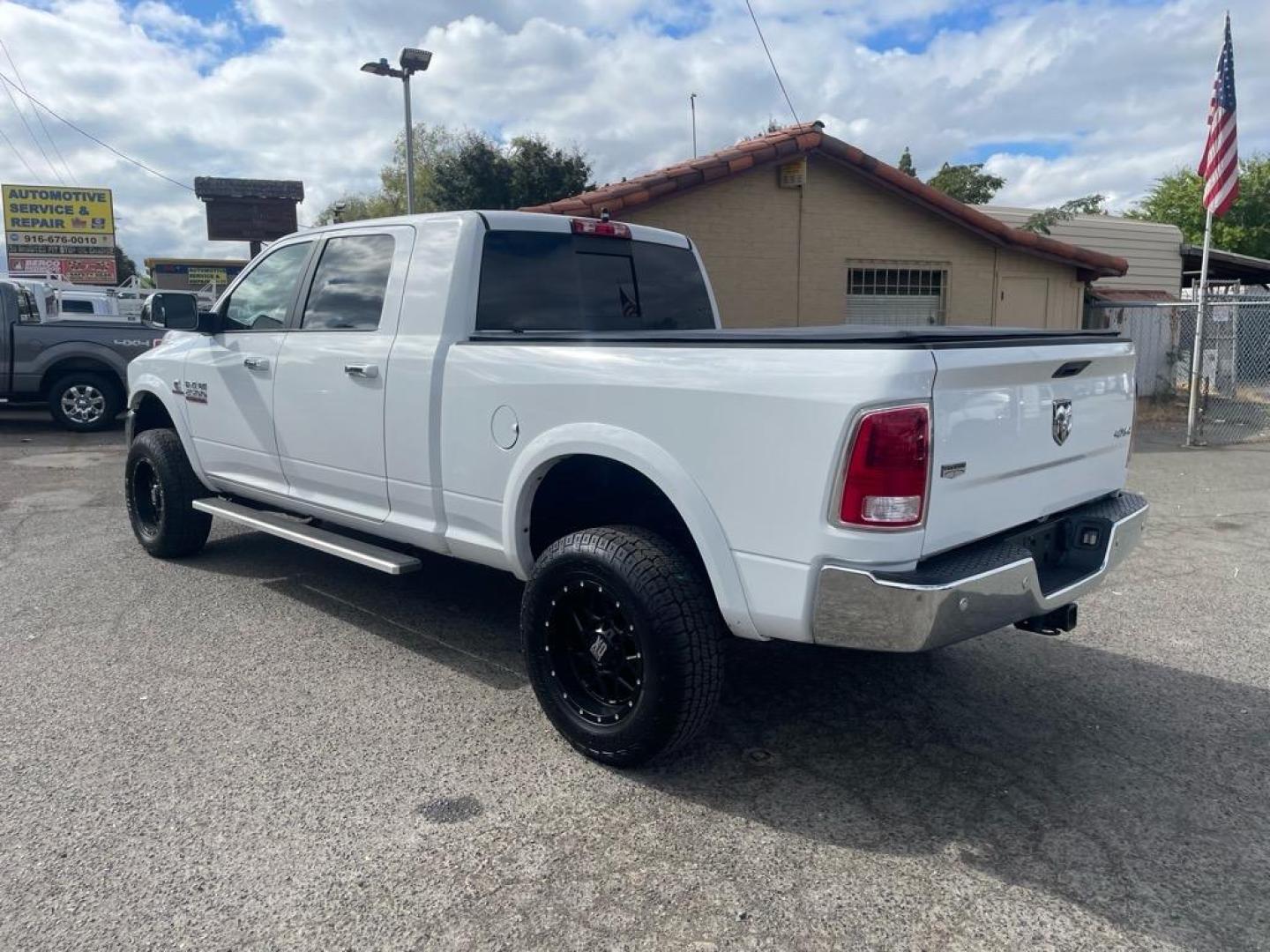 2017 Bright White Clear Coat RAM 2500 Laramie (3C6UR5NL6HG) with an 6.7L Cummins 6.7L Diesel Turbo I6 350hp 660ft. lbs. Common Rail Direct Injection engine, Automatic transmission, located at 800 Riverside Ave, Roseville, CA, 95678, 916-773-4549 & Toll Free: 866-719-4393, 38.732265, -121.291039 - CUMMINS DIESEL MEGA CAB 4X4 LARAMIE CLEAN CARFAX - Photo#2