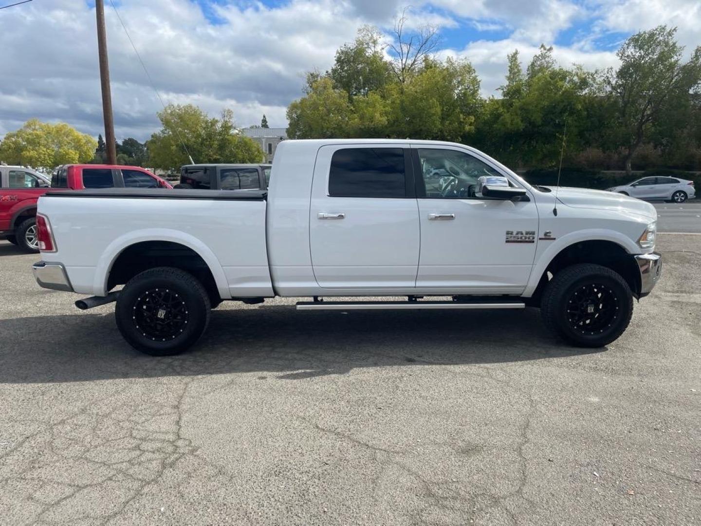 2017 Bright White Clear Coat RAM 2500 Laramie (3C6UR5NL6HG) with an 6.7L Cummins 6.7L Diesel Turbo I6 350hp 660ft. lbs. Common Rail Direct Injection engine, Automatic transmission, located at 800 Riverside Ave, Roseville, CA, 95678, 916-773-4549 & Toll Free: 866-719-4393, 38.732265, -121.291039 - CUMMINS DIESEL MEGA CAB 4X4 LARAMIE CLEAN CARFAX - Photo#5