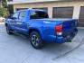 2017 Blazing Blue Metallic /Gray Toyota Tacoma SR5 Double Cab Long Bed V6 6AT 2WD (5TFAZ5CN3HX) with an 3.6L V6 DOHC 24V engine, 6A transmission, located at 30 S. Berkeley Avenue, Pasadena, CA, 91107, (626) 248-7567, 34.145447, -118.109398 - 2017 Toyota Tacoma SR5 – V6, Double Cab – Blazing Blue Metallic – Buy Here Pay Here Pasadena Looking for a dependable and powerful midsize pickup that’s ready for work or play? Check out this 2017 Toyota Tacoma SR5 Double Cab finished in the eye-catching Blazing Blue Metallic. This Tacoma o - Photo#2