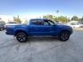 2017 Blazing Blue Metallic /Gray Toyota Tacoma SR5 Double Cab Long Bed V6 6AT 2WD (5TFAZ5CN3HX) with an 3.6L V6 DOHC 24V engine, 6A transmission, located at 30 S. Berkeley Avenue, Pasadena, CA, 91107, (626) 248-7567, 34.145447, -118.109398 - 2017 Toyota Tacoma SR5 – V6, Double Cab – Blazing Blue Metallic – Buy Here Pay Here Pasadena Looking for a dependable and powerful midsize pickup that’s ready for work or play? Check out this 2017 Toyota Tacoma SR5 Double Cab finished in the eye-catching Blazing Blue Metallic. This Tacoma o - Photo#4
