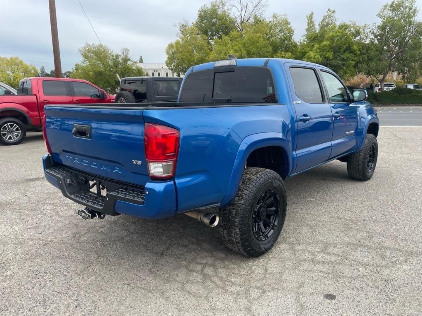 2017 Blazing Blue Pearl Toyota Tacoma TRD Sport (5TFCZ5AN6HX) with an 3.5L 3.5L V6 278hp 265ft. lbs. Direct Injection engine, 6-Speed Manual transmission, located at 800 Riverside Ave, Roseville, CA, 95678, 916-773-4549 & Toll Free: 866-719-4393, 38.732265, -121.291039 - 4X4 DOUBLE CAB TRD SPORT LEATHER MOON ROOF SERVICE RECORDS MANUAL TRANSMISSION - Photo#4