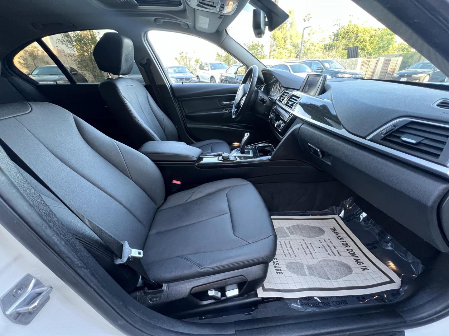 2018 Alpine White /Black BMW 3-Series 320i Sedan with an 2.0L L4 DOHC 16V engine, 8A transmission, located at 30 S. Berkeley Avenue, Pasadena, CA, 91107, (626) 248-7567, 34.145447, -118.109398 - 2018 BMW 320i Sedan – Buy Here Pay Here – $995 Down – Bad Credit OK – Crown City Motors Pasadena Experience affordable luxury in this 2018 BMW 320i Sedan, now available at Crown City Motors in Pasadena with Buy Here Pay Here financing. This stylish, German-engineered sedan delivers both per - Photo#13