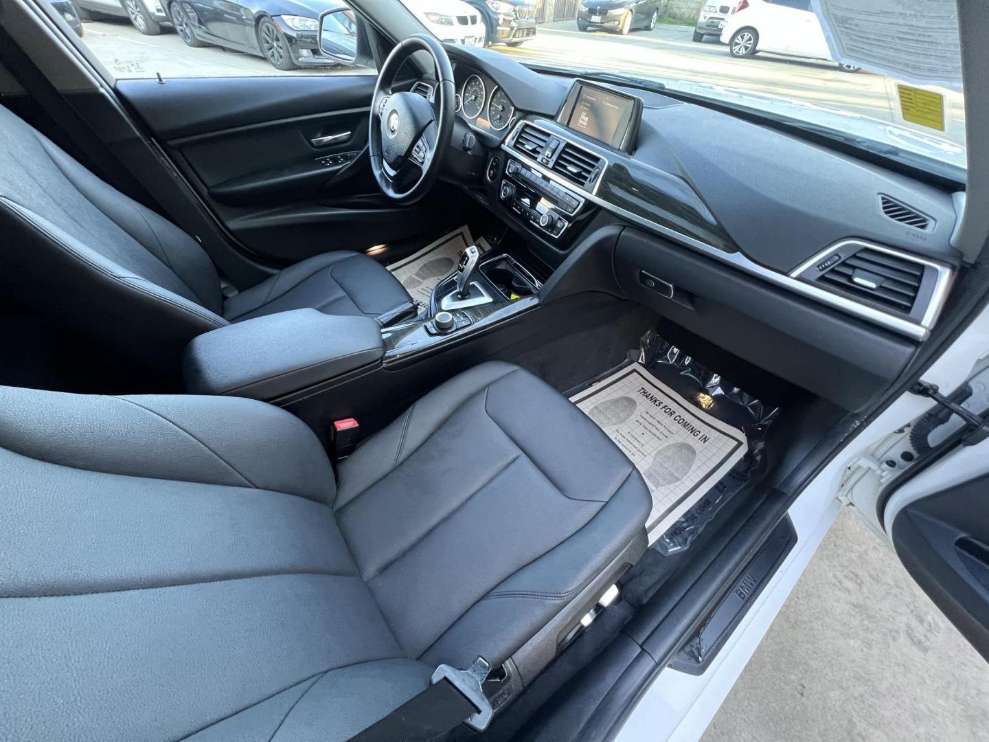 2018 Alpine White /Black BMW 3-Series 320i Sedan with an 2.0L L4 DOHC 16V engine, 8A transmission, located at 30 S. Berkeley Avenue, Pasadena, CA, 91107, (626) 248-7567, 34.145447, -118.109398 - 2018 BMW 320i Sedan – Buy Here Pay Here – $995 Down – Bad Credit OK – Crown City Motors Pasadena Experience affordable luxury in this 2018 BMW 320i Sedan, now available at Crown City Motors in Pasadena with Buy Here Pay Here financing. This stylish, German-engineered sedan delivers both per - Photo#21
