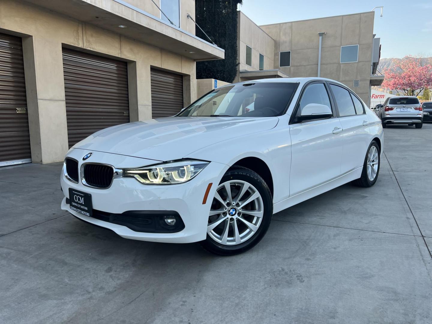 2018 Alpine White /Black BMW 3-Series 320i Sedan with an 2.0L L4 DOHC 16V engine, 8A transmission, located at 30 S. Berkeley Avenue, Pasadena, CA, 91107, (626) 248-7567, 34.145447, -118.109398 - 2018 BMW 320i Sedan – Buy Here Pay Here – $995 Down – Bad Credit OK – Crown City Motors Pasadena Experience affordable luxury in this 2018 BMW 320i Sedan, now available at Crown City Motors in Pasadena with Buy Here Pay Here financing. This stylish, German-engineered sedan delivers both per - Photo#0