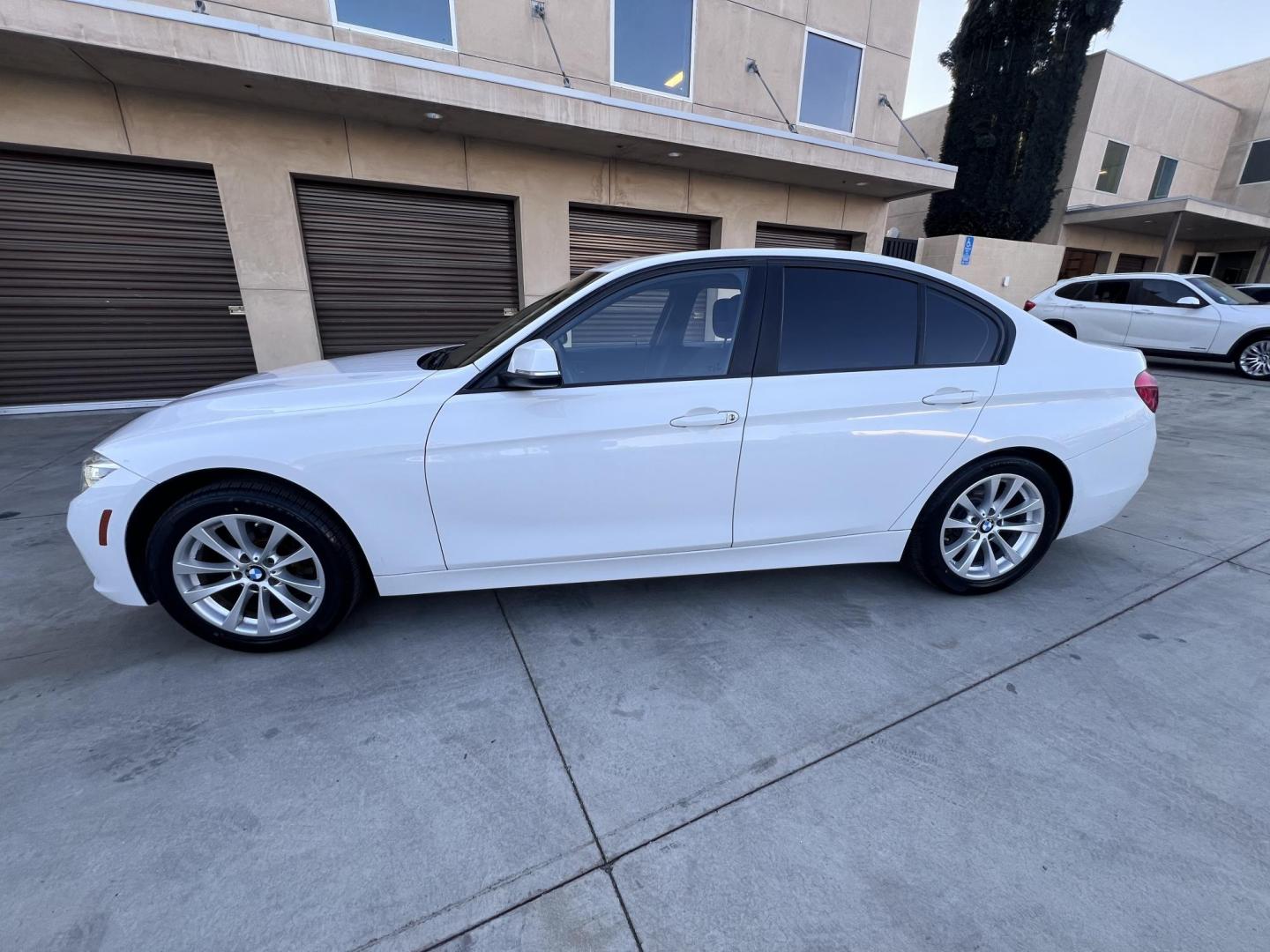 2018 Alpine White /Black BMW 3-Series 320i Sedan with an 2.0L L4 DOHC 16V engine, 8A transmission, located at 30 S. Berkeley Avenue, Pasadena, CA, 91107, (626) 248-7567, 34.145447, -118.109398 - 2018 BMW 320i Sedan – Buy Here Pay Here – $995 Down – Bad Credit OK – Crown City Motors Pasadena Experience affordable luxury in this 2018 BMW 320i Sedan, now available at Crown City Motors in Pasadena with Buy Here Pay Here financing. This stylish, German-engineered sedan delivers both per - Photo#1