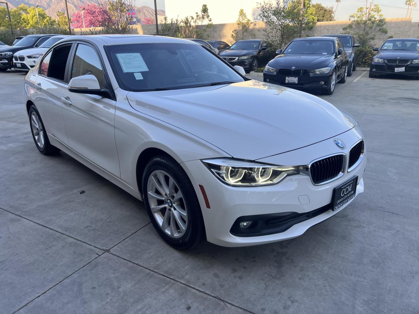 2018 Alpine White /Black BMW 3-Series 320i Sedan with an 2.0L L4 DOHC 16V engine, 8A transmission, located at 30 S. Berkeley Avenue, Pasadena, CA, 91107, (626) 248-7567, 34.145447, -118.109398 - 2018 BMW 320i Sedan – Buy Here Pay Here – $995 Down – Bad Credit OK – Crown City Motors Pasadena Experience affordable luxury in this 2018 BMW 320i Sedan, now available at Crown City Motors in Pasadena with Buy Here Pay Here financing. This stylish, German-engineered sedan delivers both per - Photo#4