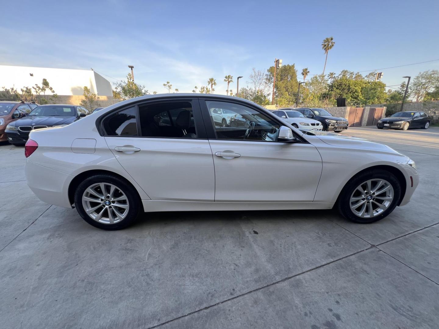 2018 Alpine White /Black BMW 3-Series 320i Sedan with an 2.0L L4 DOHC 16V engine, 8A transmission, located at 30 S. Berkeley Avenue, Pasadena, CA, 91107, (626) 248-7567, 34.145447, -118.109398 - 2018 BMW 320i Sedan – Buy Here Pay Here – $995 Down – Bad Credit OK – Crown City Motors Pasadena Experience affordable luxury in this 2018 BMW 320i Sedan, now available at Crown City Motors in Pasadena with Buy Here Pay Here financing. This stylish, German-engineered sedan delivers both per - Photo#5