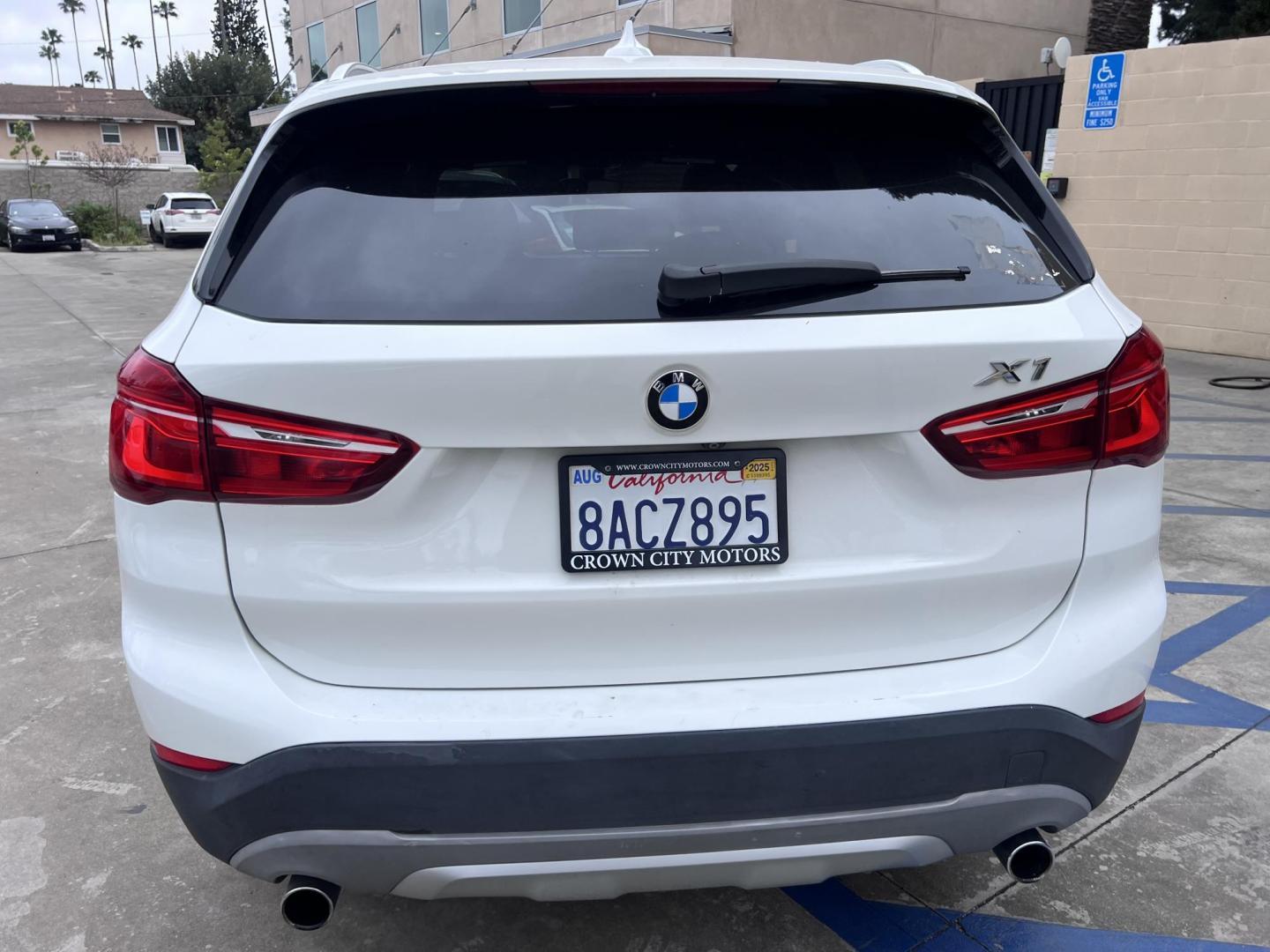 2018 White /Beige BMW X1 sDrive28i (WBXHU7C38J5) with an 2.0L L4 DOHC 16V engine, 8A transmission, located at 30 S. Berkeley Avenue, Pasadena, CA, 91107, (626) 248-7567, 34.145447, -118.109398 - Crown City Motors is a used “Buy Here Pay Here” car dealer in Pasadena CA. “Buy Here Pay Here” financing, means that when you purchase your vehicle from our dealership, that you make the payments to the dealership as well. We do not need the banks approval to get you approved for a used auto - Photo#3