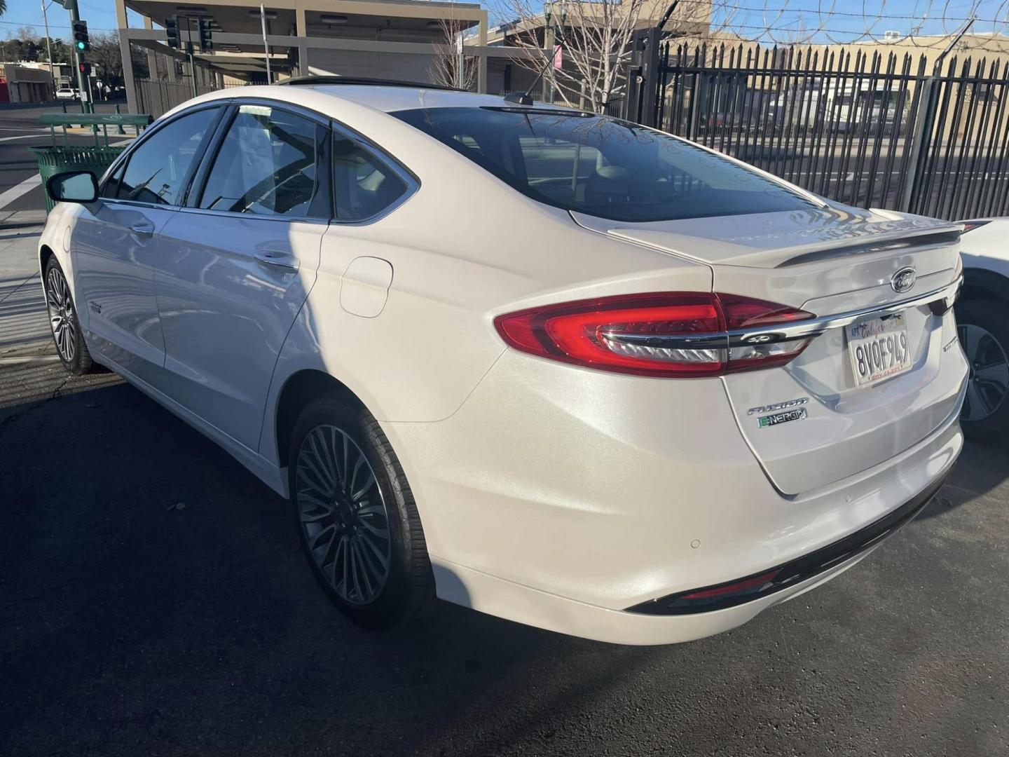 2018 WHITE Ford Fusion Energi Titanium (3FA6P0SUXJR) with an 2.0L L4 DOHC 16V HYBRID engine, CVT transmission, located at 744 E Miner Ave, Stockton, CA, 95202, (209) 944-5770, 37.956863, -121.282082 - PLUS TAXES AND FEEDS - Photo#10