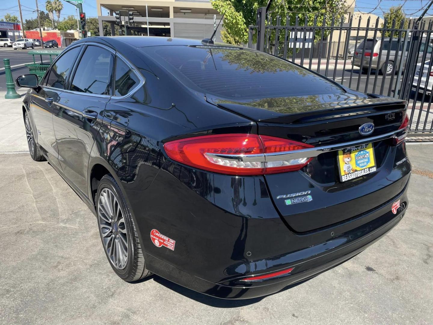 2018 BLACK /BLACK Ford Fusion Energi Titanium (3FA6P0SU1JR) with an 2.0L L4 DOHC 16V HYBRID engine, CVT transmission, located at 744 E Miner Ave, Stockton, CA, 95202, (209) 944-5770, 37.956863, -121.282082 - PPLUS TAXES AND FEES - Photo#12