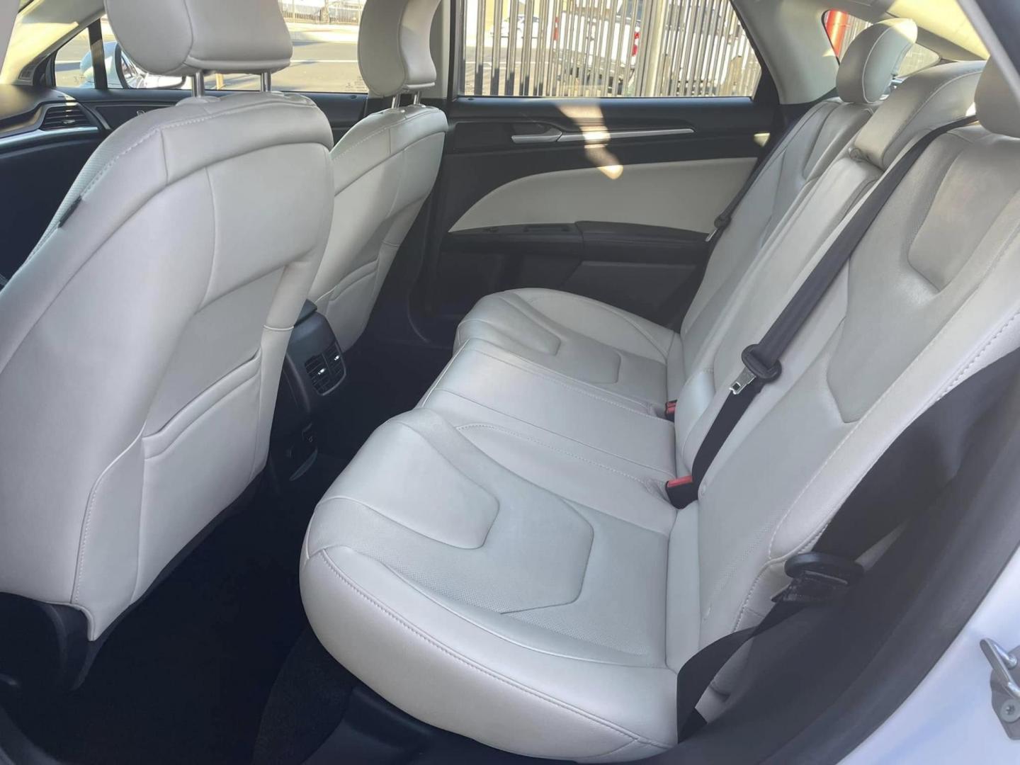 2018 WHITE Ford Fusion Energi Titanium (3FA6P0SUXJR) with an 2.0L L4 DOHC 16V HYBRID engine, CVT transmission, located at 744 E Miner Ave, Stockton, CA, 95202, (209) 944-5770, 37.956863, -121.282082 - PLUS TAXES AND FEEDS - Photo#9