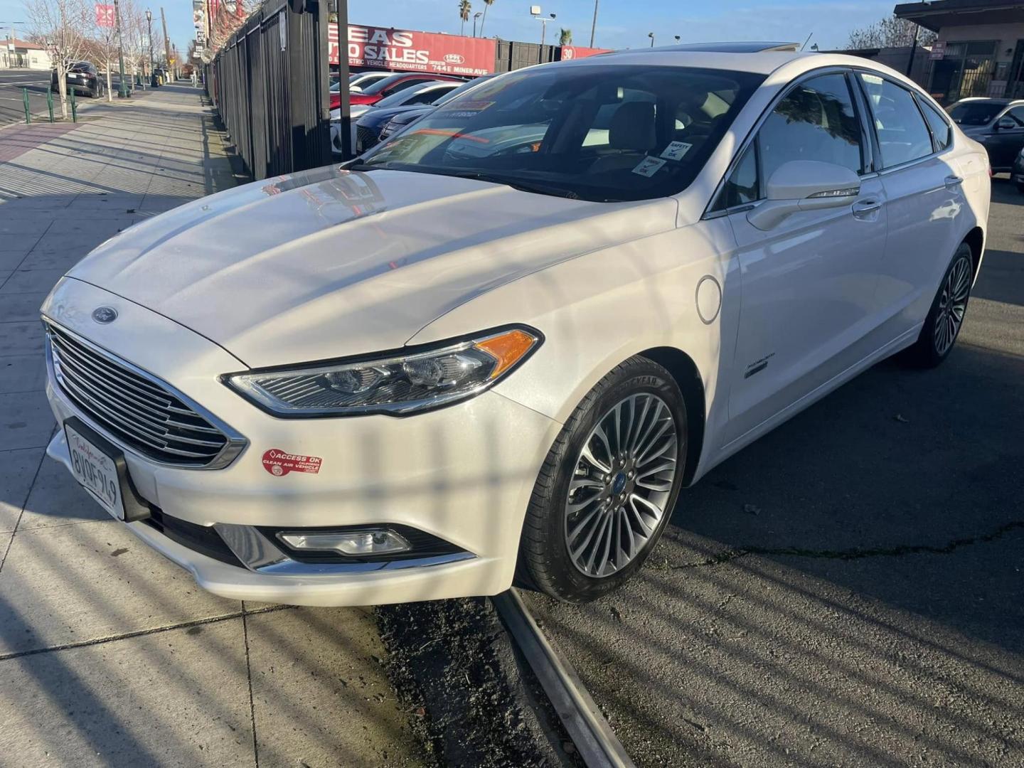 2018 WHITE Ford Fusion Energi Titanium (3FA6P0SUXJR) with an 2.0L L4 DOHC 16V HYBRID engine, CVT transmission, located at 744 E Miner Ave, Stockton, CA, 95202, (209) 944-5770, 37.956863, -121.282082 - PLUS TAXES AND FEEDS - Photo#3