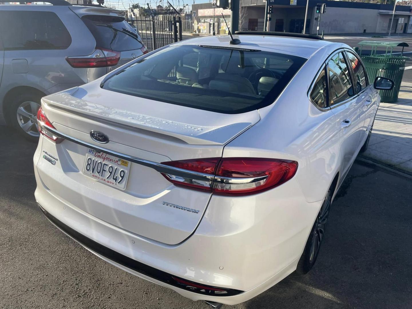 2018 WHITE Ford Fusion Energi Titanium (3FA6P0SUXJR) with an 2.0L L4 DOHC 16V HYBRID engine, CVT transmission, located at 744 E Miner Ave, Stockton, CA, 95202, (209) 944-5770, 37.956863, -121.282082 - PLUS TAXES AND FEEDS - Photo#12