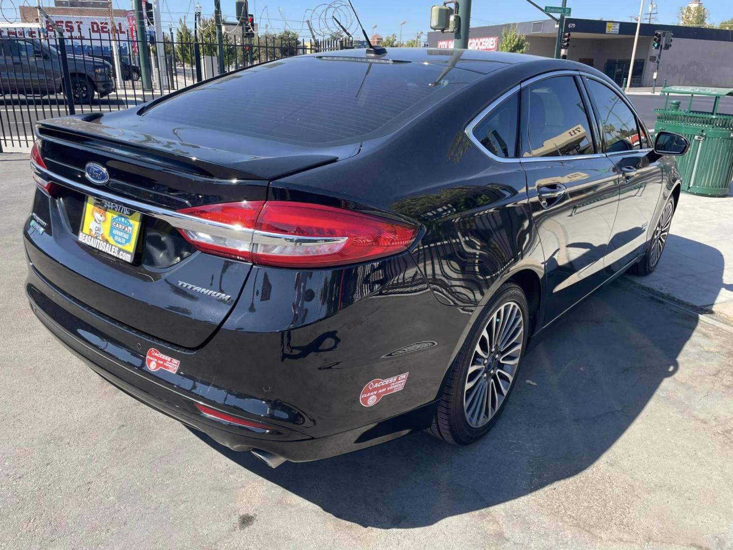 2018 BLACK /BLACK Ford Fusion Energi Titanium (3FA6P0SU1JR) with an 2.0L L4 DOHC 16V HYBRID engine, CVT transmission, located at 744 E Miner Ave, Stockton, CA, 95202, (209) 944-5770, 37.956863, -121.282082 - PPLUS TAXES AND FEES - Photo#14