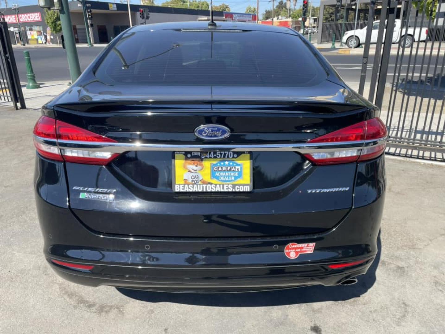 2018 BLACK /BLACK Ford Fusion Energi Titanium (3FA6P0SU1JR) with an 2.0L L4 DOHC 16V HYBRID engine, CVT transmission, located at 744 E Miner Ave, Stockton, CA, 95202, (209) 944-5770, 37.956863, -121.282082 - PPLUS TAXES AND FEES - Photo#13