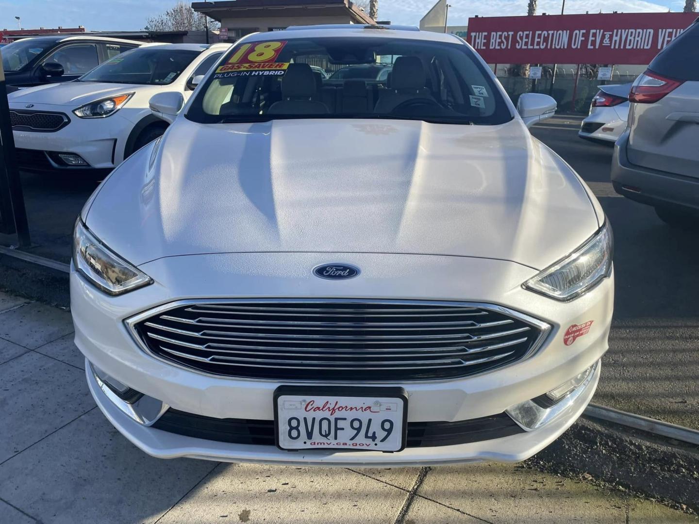 2018 WHITE Ford Fusion Energi Titanium (3FA6P0SUXJR) with an 2.0L L4 DOHC 16V HYBRID engine, CVT transmission, located at 744 E Miner Ave, Stockton, CA, 95202, (209) 944-5770, 37.956863, -121.282082 - PLUS TAXES AND FEEDS - Photo#2