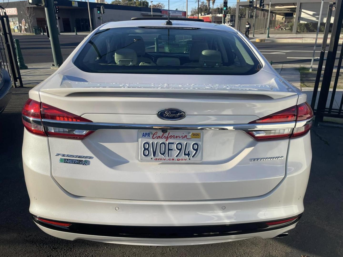 2018 WHITE Ford Fusion Energi Titanium (3FA6P0SUXJR) with an 2.0L L4 DOHC 16V HYBRID engine, CVT transmission, located at 744 E Miner Ave, Stockton, CA, 95202, (209) 944-5770, 37.956863, -121.282082 - PLUS TAXES AND FEEDS - Photo#11