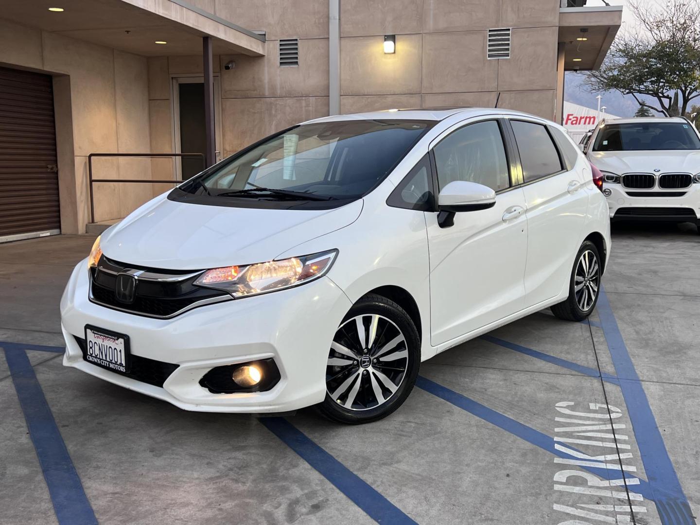 2018 White /Black Honda Fit EX-L CVT (3HGGK5H82JM) with an 1.5L L4 SOHC 16V engine, CVT transmission, located at 30 S. Berkeley Avenue, Pasadena, CA, 91107, (626) 248-7567, 34.145447, -118.109398 - Discover the perfect blend of practicality, style, and efficiency with the 2018 Honda Fit, a compact car designed to make your daily drives more enjoyable and cost-effective. This versatile hatchback comes equipped with a backup camera, advanced features, and Honda's renowned reliability, making it - Photo#0
