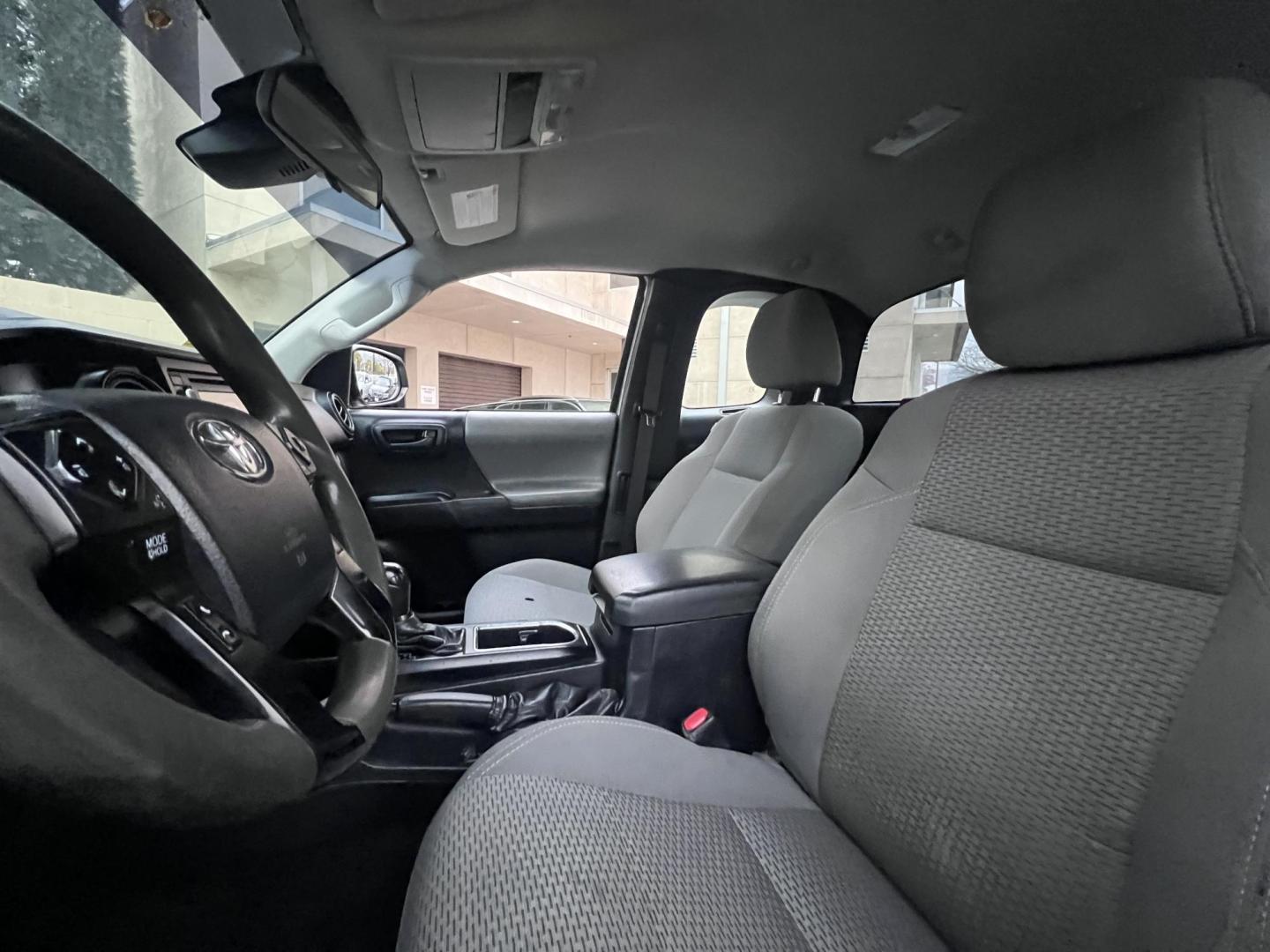 2018 Space Gray Metallic Toyota Tacoma SR5 Access Cab I4 6AT 2WD (5TFRX5GNXJX) with an 2.7L L4 DOHC 16V engine, 6A transmission, located at 30 S. Berkeley Avenue, Pasadena, CA, 91107, (626) 248-7567, 34.145447, -118.109398 - Crown City Motors is a used “Buy Here Pay Here” car dealer in Pasadena CA. “Buy Here Pay Here” financing, means that when you purchase your vehicle from our dealership, that you make the payments to the dealership as well. We do not need the banks approval to get you approved for a used auto - Photo#18