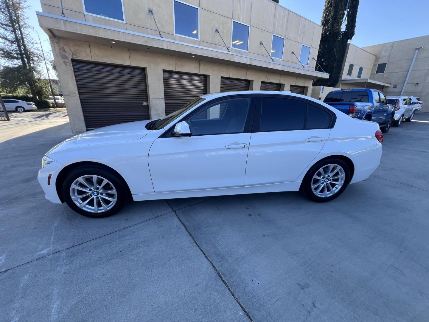 2018 Alpine White /Black BMW 3-Series 320i Sedan with an 2.0L L4 DOHC 16V engine, 8A transmission, located at 30 S. Berkeley Avenue, Pasadena, CA, 91107, (626) 248-7567, 34.145447, -118.109398 - 2018 BMW 320i Sedan – Buy Here Pay Here – $995 Down – Bad Credit OK – Crown City Motors Pasadena Experience affordable luxury in this 2018 BMW 320i Sedan, now available at Crown City Motors in Pasadena with Buy Here Pay Here financing. This stylish, German-engineered sedan delivers both per - Photo#35