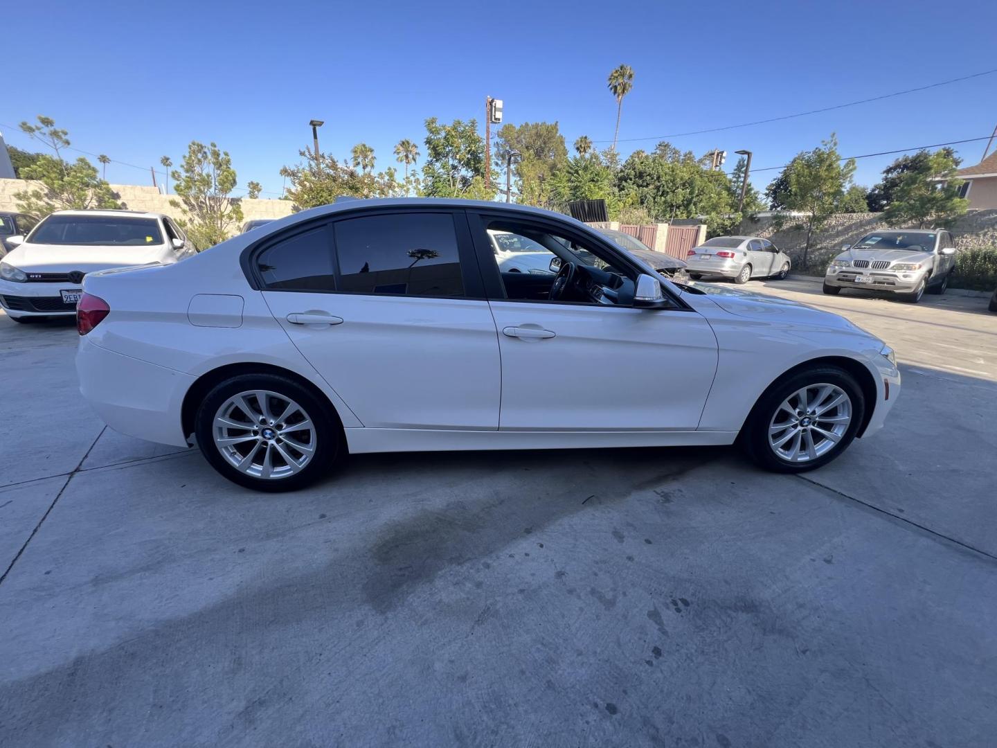 2018 Alpine White /Black BMW 3-Series 320i Sedan with an 2.0L L4 DOHC 16V engine, 8A transmission, located at 30 S. Berkeley Avenue, Pasadena, CA, 91107, (626) 248-7567, 34.145447, -118.109398 - 2018 BMW 320i Sedan – Buy Here Pay Here – $995 Down – Bad Credit OK – Crown City Motors Pasadena Experience affordable luxury in this 2018 BMW 320i Sedan, now available at Crown City Motors in Pasadena with Buy Here Pay Here financing. This stylish, German-engineered sedan delivers both per - Photo#38