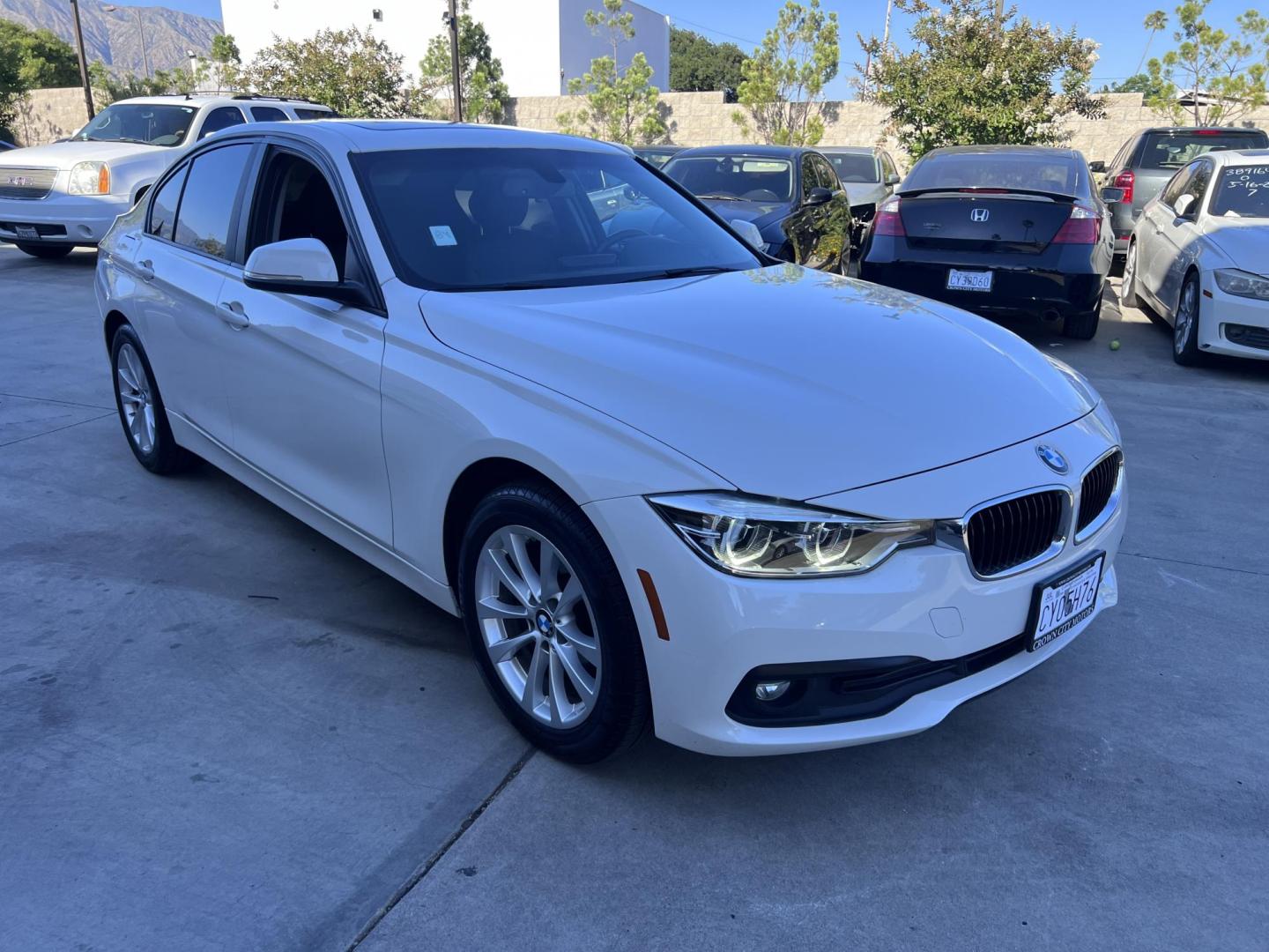 2018 Alpine White /Black BMW 3-Series 320i Sedan with an 2.0L L4 DOHC 16V engine, 8A transmission, located at 30 S. Berkeley Avenue, Pasadena, CA, 91107, (626) 248-7567, 34.145447, -118.109398 - 2018 BMW 320i Sedan – Buy Here Pay Here – $995 Down – Bad Credit OK – Crown City Motors Pasadena Experience affordable luxury in this 2018 BMW 320i Sedan, now available at Crown City Motors in Pasadena with Buy Here Pay Here financing. This stylish, German-engineered sedan delivers both per - Photo#39