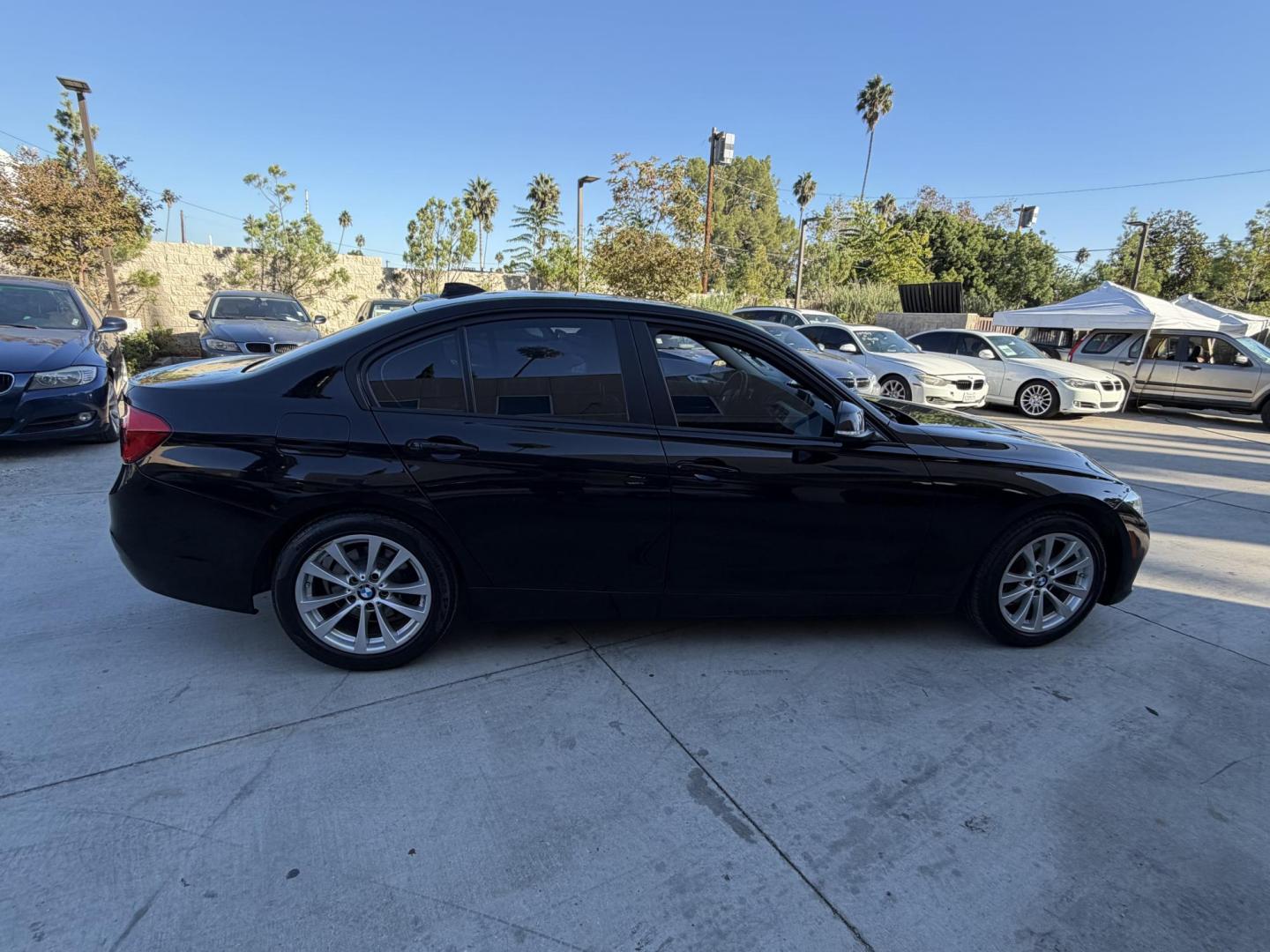 2018 Black /BLACK BMW 3-Series 320i Sedan (WBA8E1G5XJN) with an 2.0L L4 DOHC 16V engine, 8A transmission, located at 30 S. Berkeley Avenue, Pasadena, CA, 91107, (626) 248-7567, 34.145447, -118.109398 - Crown City Motors is a used “Buy Here Pay Here” car dealer in Pasadena CA. “Buy Here Pay Here” financing, means that when you purchase your vehicle from our dealership, that you make the payments to the dealership as well. We do not need the banks approval to get you approved for a used auto - Photo#3