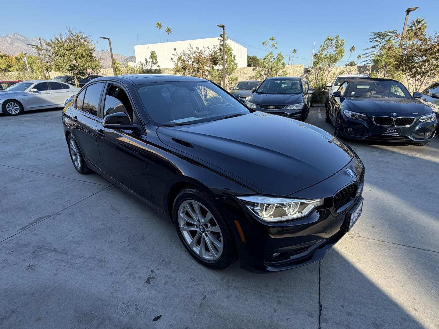 2018 Black /BLACK BMW 3-Series 320i Sedan (WBA8E1G5XJN) with an 2.0L L4 DOHC 16V engine, 8A transmission, located at 30 S. Berkeley Avenue, Pasadena, CA, 91107, (626) 248-7567, 34.145447, -118.109398 - Crown City Motors is a used “Buy Here Pay Here” car dealer in Pasadena CA. “Buy Here Pay Here” financing, means that when you purchase your vehicle from our dealership, that you make the payments to the dealership as well. We do not need the banks approval to get you approved for a used auto - Photo#6