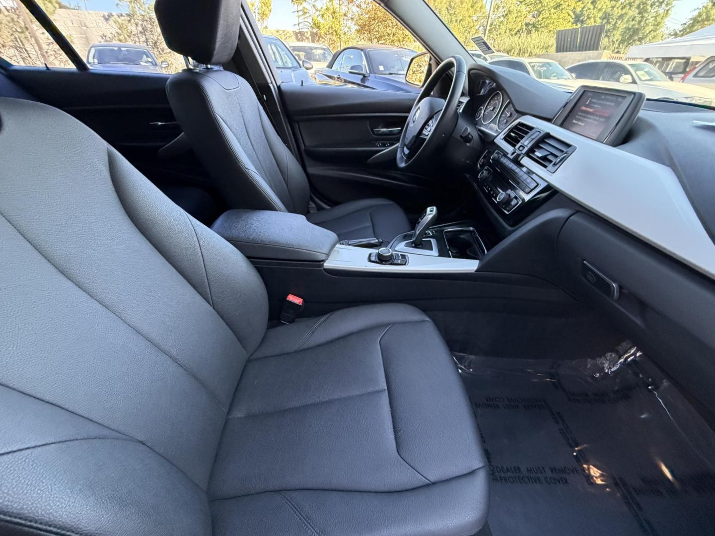 2018 Black /BLACK BMW 3-Series 320i Sedan (WBA8E1G5XJN) with an 2.0L L4 DOHC 16V engine, 8A transmission, located at 30 S. Berkeley Avenue, Pasadena, CA, 91107, (626) 248-7567, 34.145447, -118.109398 - Crown City Motors is a used “Buy Here Pay Here” car dealer in Pasadena CA. “Buy Here Pay Here” financing, means that when you purchase your vehicle from our dealership, that you make the payments to the dealership as well. We do not need the banks approval to get you approved for a used auto - Photo#12