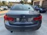 2018 Gray metallic /BLACK BMW 3-Series 320i Sedan (WBA8E1G57JN) with an 2.0L L4 DOHC 16V engine, 8A transmission, located at 30 S. Berkeley Avenue, Pasadena, CA, 91107, (626) 248-7567, 34.145447, -118.109398 - Crown City Motors is a used “Buy Here Pay Here” car dealer in Pasadena CA. “Buy Here Pay Here” financing, means that when you purchase your vehicle from our dealership, that you make the payments to the dealership as well. We do not need the banks approval to get you approved for a used auto - Photo#3