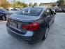 2018 Gray metallic /BLACK BMW 3-Series 320i Sedan (WBA8E1G57JN) with an 2.0L L4 DOHC 16V engine, 8A transmission, located at 30 S. Berkeley Avenue, Pasadena, CA, 91107, (626) 248-7567, 34.145447, -118.109398 - Crown City Motors is a used “Buy Here Pay Here” car dealer in Pasadena CA. “Buy Here Pay Here” financing, means that when you purchase your vehicle from our dealership, that you make the payments to the dealership as well. We do not need the banks approval to get you approved for a used auto - Photo#4