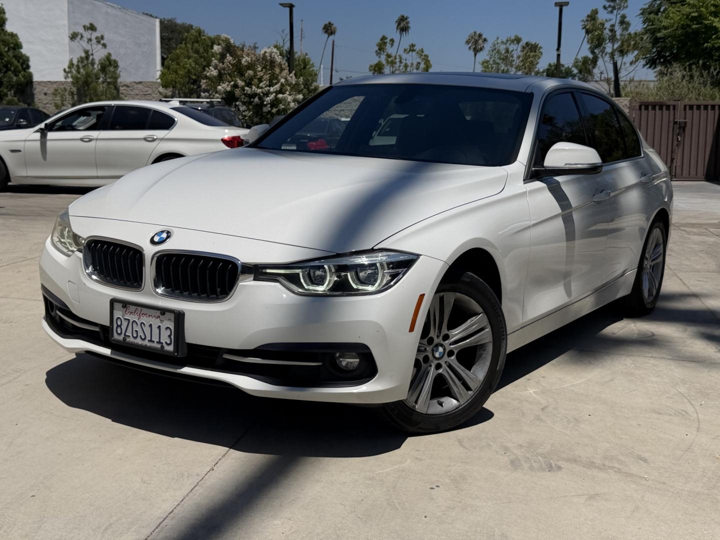 2018 Black /White BMW 3-Series 330i SULEV Sedan (WBA8B9C54JE) with an 3.0L L6 DOHC 24V engine, 8A transmission, located at 30 S. Berkeley Avenue, Pasadena, CA, 91107, (626) 248-7567, 34.145447, -118.109398 - Crown City Motors is a used “Buy Here Pay Here” car dealer in Pasadena CA. “Buy Here Pay Here” financing, means that when you purchase your vehicle from our dealership, that you make the payments to the dealership as well. We do not need the banks approval to get you approved for a used auto - Photo#0