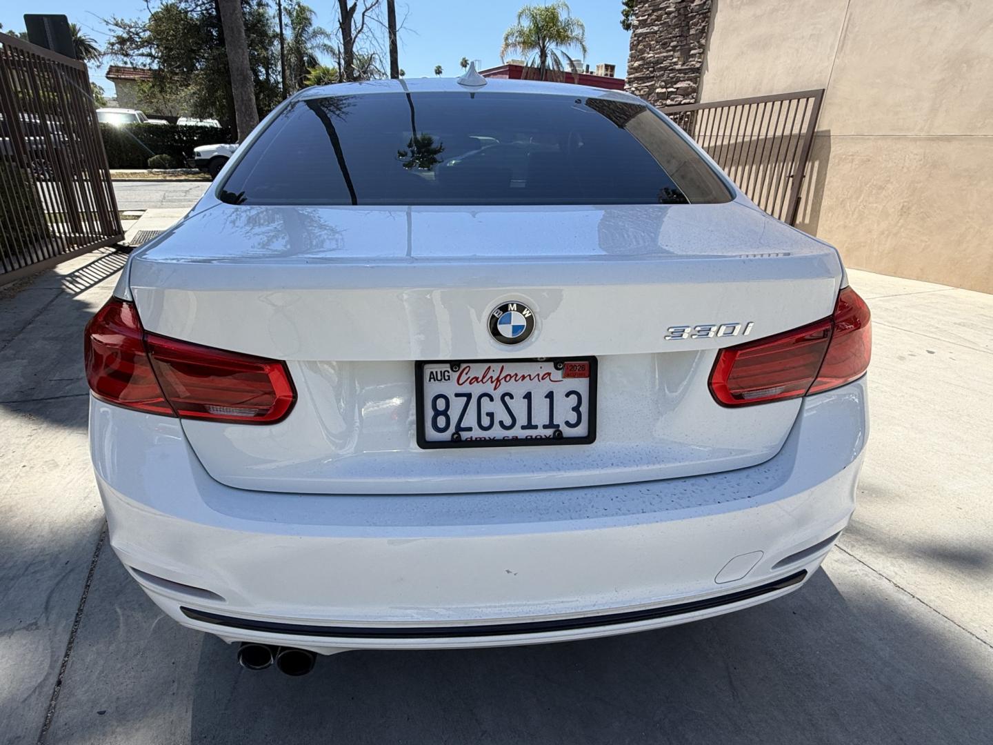 2018 Black /White BMW 3-Series 330i SULEV Sedan (WBA8B9C54JE) with an 3.0L L6 DOHC 24V engine, 8A transmission, located at 30 S. Berkeley Avenue, Pasadena, CA, 91107, (626) 248-7567, 34.145447, -118.109398 - Crown City Motors is a used “Buy Here Pay Here” car dealer in Pasadena CA. “Buy Here Pay Here” financing, means that when you purchase your vehicle from our dealership, that you make the payments to the dealership as well. We do not need the banks approval to get you approved for a used auto - Photo#3