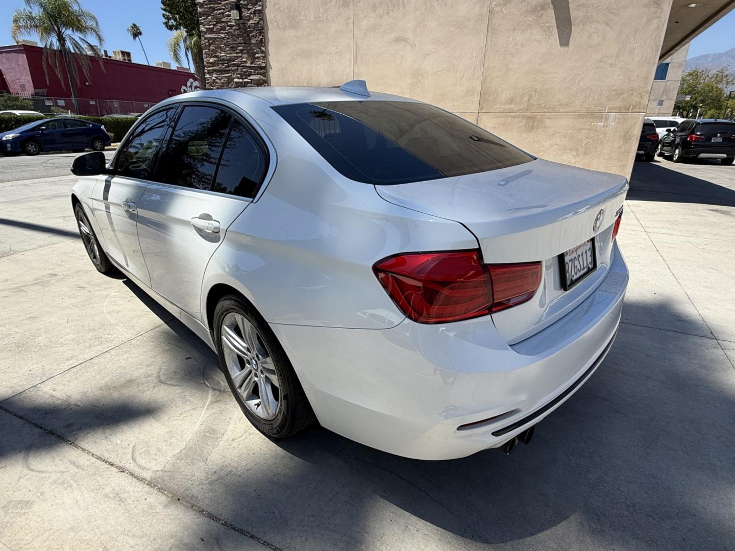 2018 Black /White BMW 3-Series 330i SULEV Sedan (WBA8B9C54JE) with an 3.0L L6 DOHC 24V engine, 8A transmission, located at 30 S. Berkeley Avenue, Pasadena, CA, 91107, (626) 248-7567, 34.145447, -118.109398 - Crown City Motors is a used “Buy Here Pay Here” car dealer in Pasadena CA. “Buy Here Pay Here” financing, means that when you purchase your vehicle from our dealership, that you make the payments to the dealership as well. We do not need the banks approval to get you approved for a used auto - Photo#4