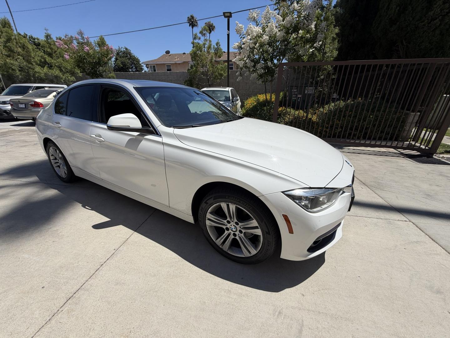 2018 Black /White BMW 3-Series 330i SULEV Sedan (WBA8B9C54JE) with an 3.0L L6 DOHC 24V engine, 8A transmission, located at 30 S. Berkeley Avenue, Pasadena, CA, 91107, (626) 248-7567, 34.145447, -118.109398 - Crown City Motors is a used “Buy Here Pay Here” car dealer in Pasadena CA. “Buy Here Pay Here” financing, means that when you purchase your vehicle from our dealership, that you make the payments to the dealership as well. We do not need the banks approval to get you approved for a used auto - Photo#8