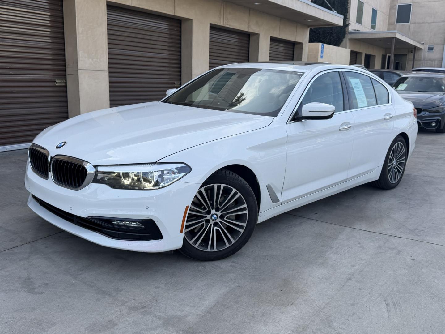 2018 White /Gray BMW 5-Series 530i (WBAJA5C58JG) with an 2.0L L4 DOHC 16V TURBO engine, 8A transmission, located at 30 S. Berkeley Avenue, Pasadena, CA, 91107, (626) 248-7567, 34.145447, -118.109398 - Photo#1