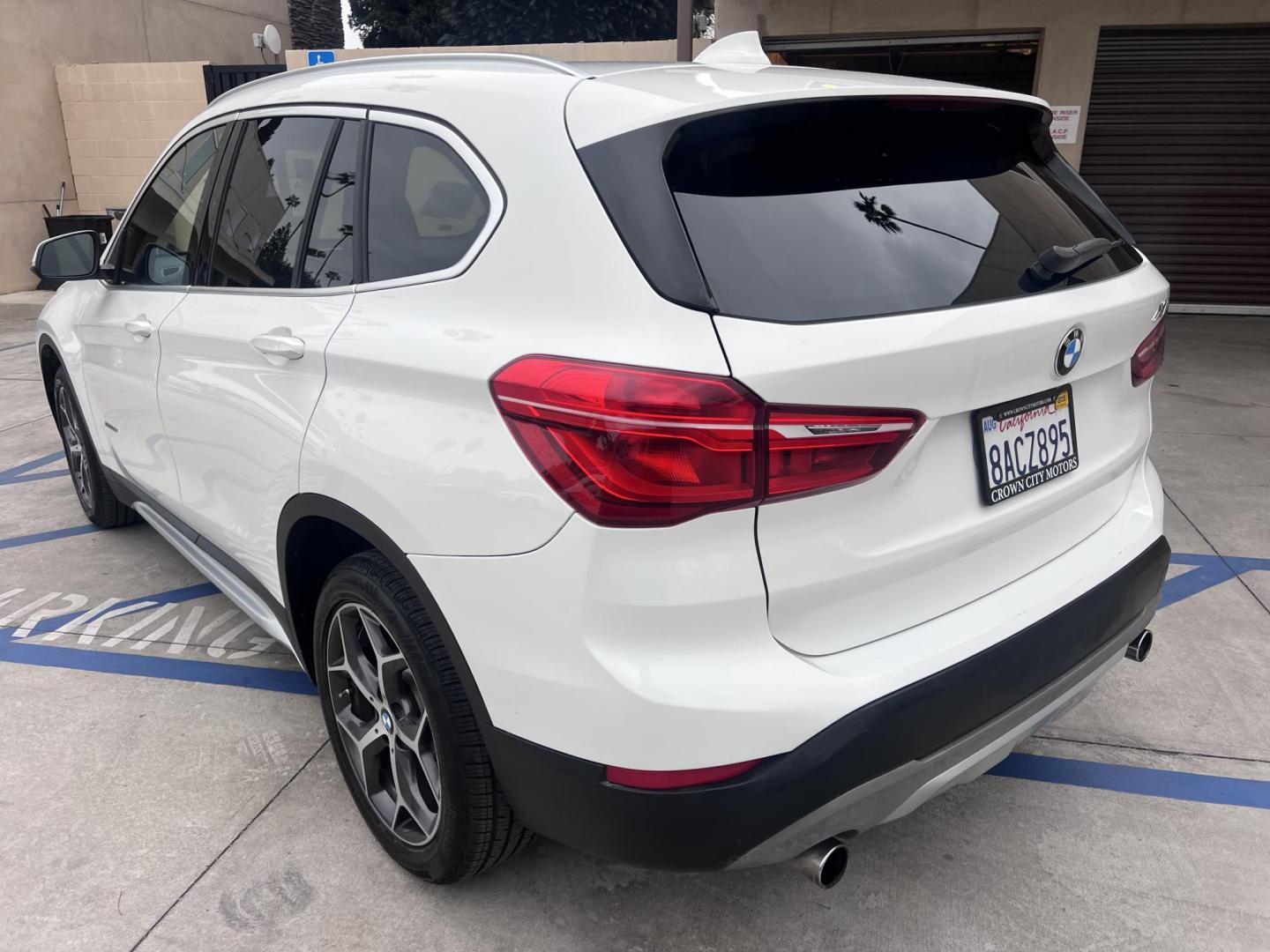 2018 White /Beige BMW X1 sDrive28i (WBXHU7C38J5) with an 2.0L L4 DOHC 16V engine, 8A transmission, located at 30 S. Berkeley Avenue, Pasadena, CA, 91107, (626) 248-7567, 34.145447, -118.109398 - Crown City Motors is a used “Buy Here Pay Here” car dealer in Pasadena CA. “Buy Here Pay Here” financing, means that when you purchase your vehicle from our dealership, that you make the payments to the dealership as well. We do not need the banks approval to get you approved for a used auto - Photo#8