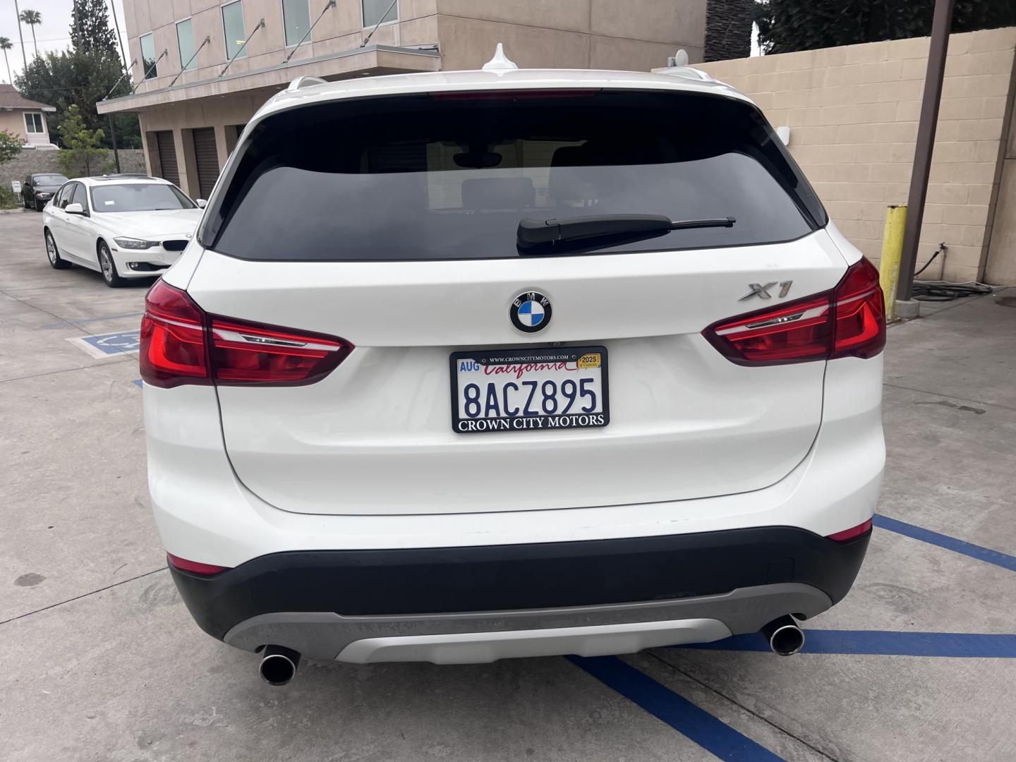 2018 White /Beige BMW X1 sDrive28i (WBXHU7C38J5) with an 2.0L L4 DOHC 16V engine, 8A transmission, located at 30 S. Berkeley Avenue, Pasadena, CA, 91107, (626) 248-7567, 34.145447, -118.109398 - Crown City Motors is a used “Buy Here Pay Here” car dealer in Pasadena CA. “Buy Here Pay Here” financing, means that when you purchase your vehicle from our dealership, that you make the payments to the dealership as well. We do not need the banks approval to get you approved for a used auto - Photo#9