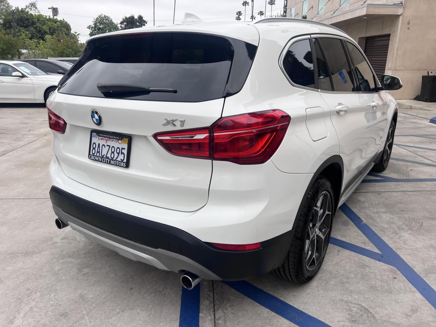 2018 White /Beige BMW X1 sDrive28i (WBXHU7C38J5) with an 2.0L L4 DOHC 16V engine, 8A transmission, located at 30 S. Berkeley Avenue, Pasadena, CA, 91107, (626) 248-7567, 34.145447, -118.109398 - Crown City Motors is a used “Buy Here Pay Here” car dealer in Pasadena CA. “Buy Here Pay Here” financing, means that when you purchase your vehicle from our dealership, that you make the payments to the dealership as well. We do not need the banks approval to get you approved for a used auto - Photo#10