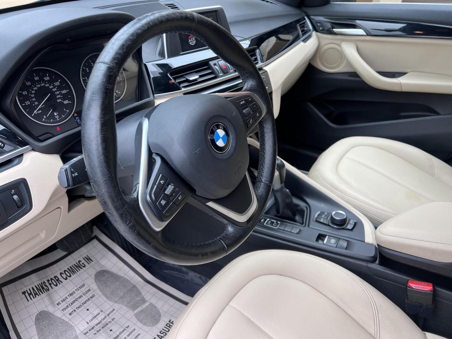 2018 White /Beige BMW X1 sDrive28i (WBXHU7C38J5) with an 2.0L L4 DOHC 16V engine, 8A transmission, located at 30 S. Berkeley Avenue, Pasadena, CA, 91107, (626) 248-7567, 34.145447, -118.109398 - Crown City Motors is a used “Buy Here Pay Here” car dealer in Pasadena CA. “Buy Here Pay Here” financing, means that when you purchase your vehicle from our dealership, that you make the payments to the dealership as well. We do not need the banks approval to get you approved for a used auto - Photo#19