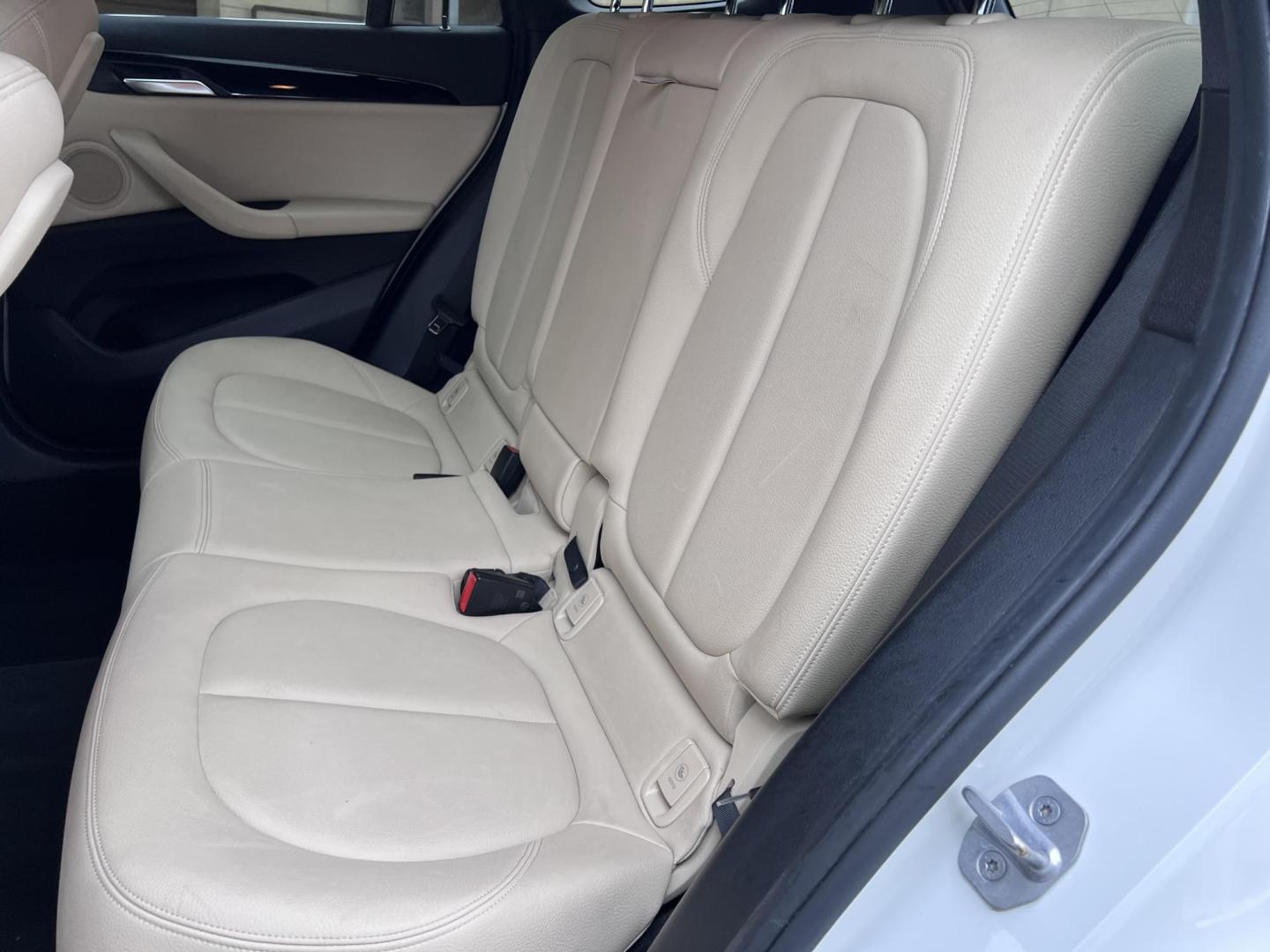 2018 White /Beige BMW X1 sDrive28i (WBXHU7C38J5) with an 2.0L L4 DOHC 16V engine, 8A transmission, located at 30 S. Berkeley Avenue, Pasadena, CA, 91107, (626) 248-7567, 34.145447, -118.109398 - Crown City Motors is a used “Buy Here Pay Here” car dealer in Pasadena CA. “Buy Here Pay Here” financing, means that when you purchase your vehicle from our dealership, that you make the payments to the dealership as well. We do not need the banks approval to get you approved for a used auto - Photo#22