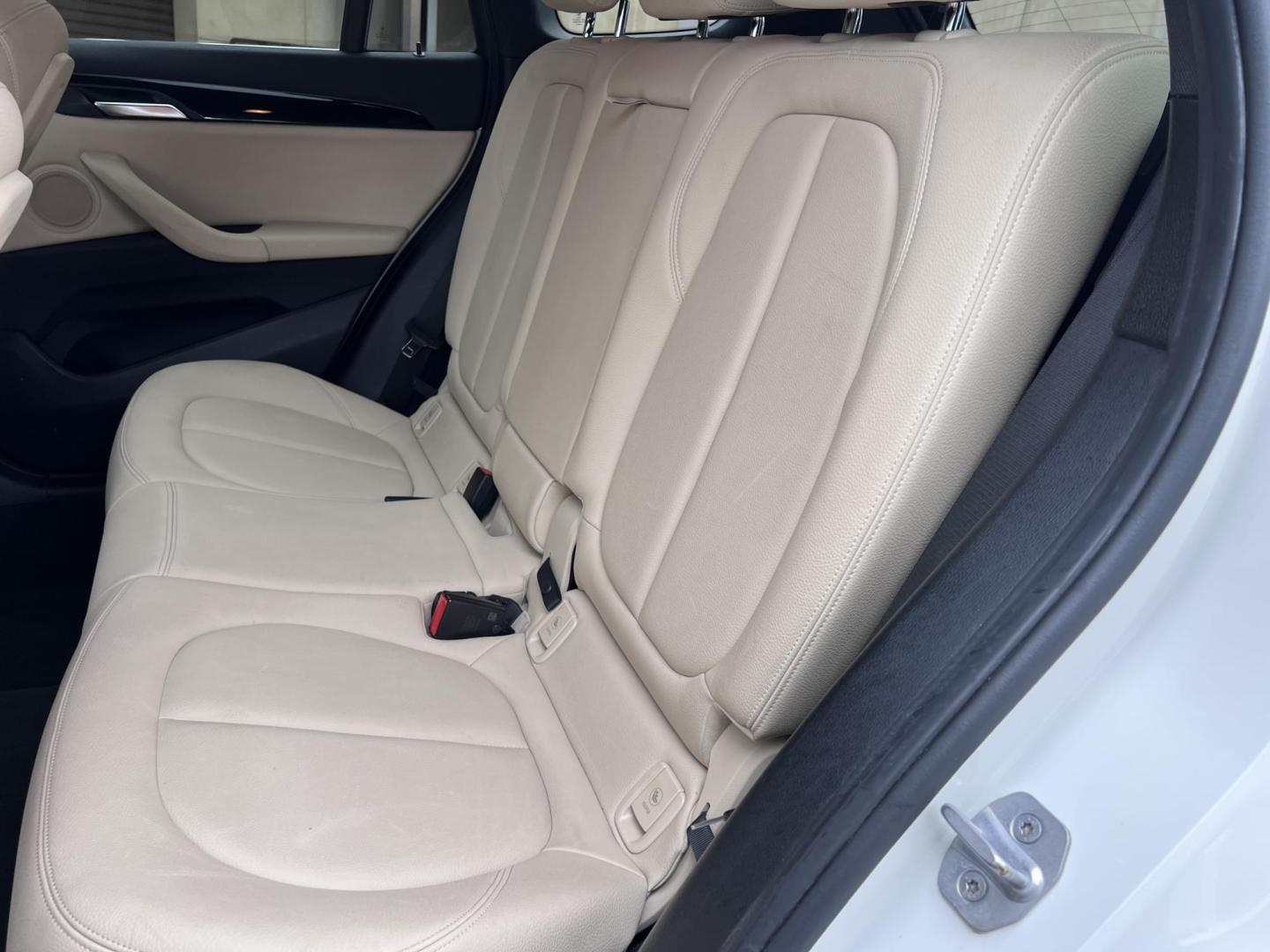 2018 White /Beige BMW X1 sDrive28i (WBXHU7C38J5) with an 2.0L L4 DOHC 16V engine, 8A transmission, located at 30 S. Berkeley Avenue, Pasadena, CA, 91107, (626) 248-7567, 34.145447, -118.109398 - Crown City Motors is a used “Buy Here Pay Here” car dealer in Pasadena CA. “Buy Here Pay Here” financing, means that when you purchase your vehicle from our dealership, that you make the payments to the dealership as well. We do not need the banks approval to get you approved for a used auto - Photo#21