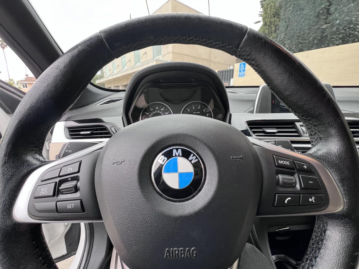 2018 White /Beige BMW X1 sDrive28i (WBXHU7C38J5) with an 2.0L L4 DOHC 16V engine, 8A transmission, located at 30 S. Berkeley Avenue, Pasadena, CA, 91107, (626) 248-7567, 34.145447, -118.109398 - Crown City Motors is a used “Buy Here Pay Here” car dealer in Pasadena CA. “Buy Here Pay Here” financing, means that when you purchase your vehicle from our dealership, that you make the payments to the dealership as well. We do not need the banks approval to get you approved for a used auto - Photo#38