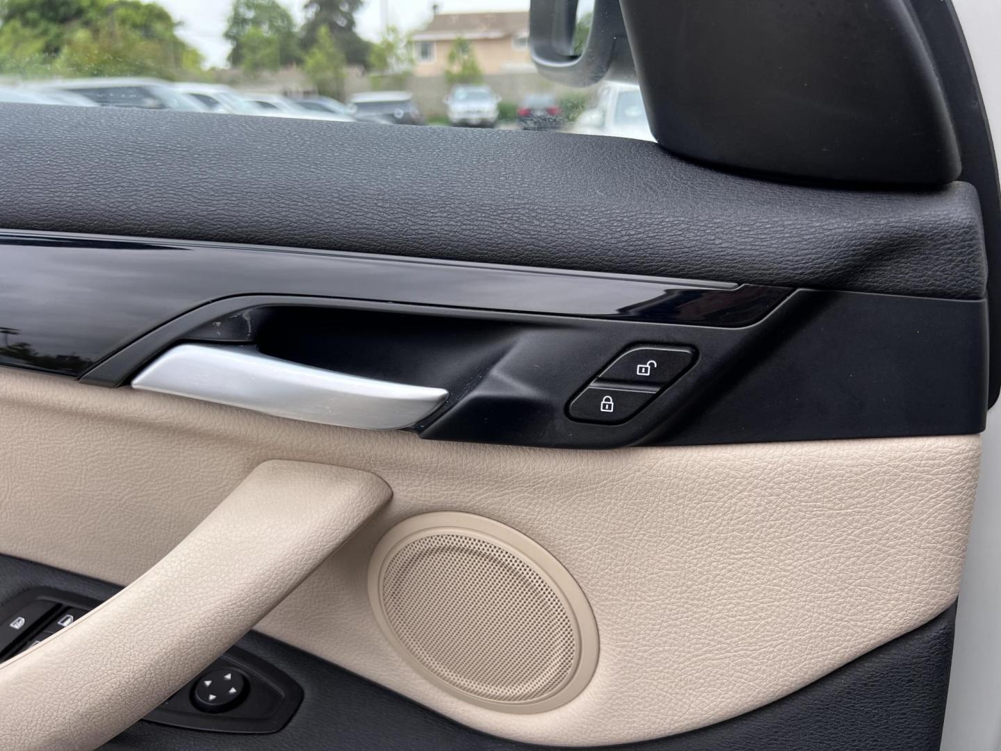 2018 White /Beige BMW X1 sDrive28i (WBXHU7C38J5) with an 2.0L L4 DOHC 16V engine, 8A transmission, located at 30 S. Berkeley Avenue, Pasadena, CA, 91107, (626) 248-7567, 34.145447, -118.109398 - Crown City Motors is a used “Buy Here Pay Here” car dealer in Pasadena CA. “Buy Here Pay Here” financing, means that when you purchase your vehicle from our dealership, that you make the payments to the dealership as well. We do not need the banks approval to get you approved for a used auto - Photo#40
