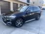 2018 BLACK /Black BMW X1 sDrive28i (WBXHU7C34J5) with an 2.0L L4 DOHC 16V engine, 8A transmission, located at 30 S. Berkeley Avenue, Pasadena, CA, 91107, (626) 248-7567, 34.145447, -118.109398 - 018 BMW X1 sDrive28i – Luxury, Performance and Affordability | Buy Here Pay Here – Pasadena, CA Step into luxury, style, and versatility with this 2018 BMW X1 sDrive28i, available now at Crown City Motors, Pasadena’s trusted Buy Here Pay Here (BHPH) dealership. Whether you're dealing with b - Photo#0