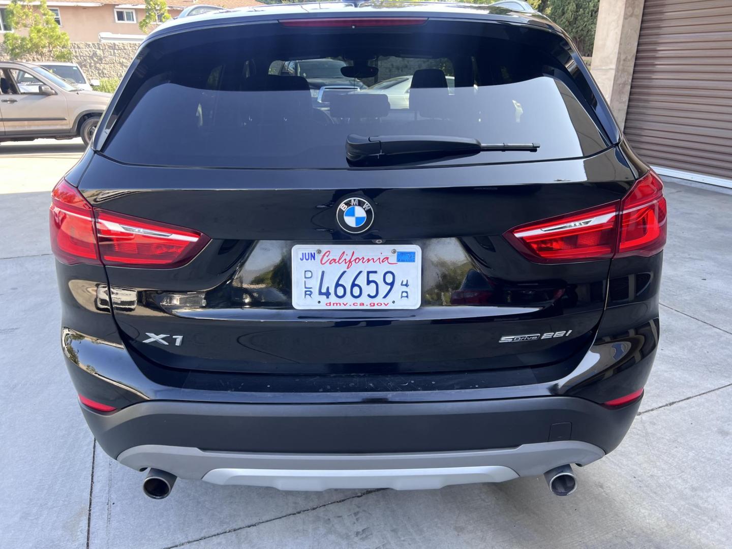 2018 BLACK /Black BMW X1 sDrive28i (WBXHU7C34J5) with an 2.0L L4 DOHC 16V engine, 8A transmission, located at 30 S. Berkeley Avenue, Pasadena, CA, 91107, (626) 248-7567, 34.145447, -118.109398 - 018 BMW X1 sDrive28i – Luxury, Performance and Affordability | Buy Here Pay Here – Pasadena, CA Step into luxury, style, and versatility with this 2018 BMW X1 sDrive28i, available now at Crown City Motors, Pasadena’s trusted Buy Here Pay Here (BHPH) dealership. Whether you're dealing with b - Photo#3