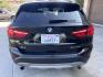 2018 BLACK /Black BMW X1 sDrive28i (WBXHU7C34J5) with an 2.0L L4 DOHC 16V engine, 8A transmission, located at 30 S. Berkeley Avenue, Pasadena, CA, 91107, (626) 248-7567, 34.145447, -118.109398 - 018 BMW X1 sDrive28i – Luxury, Performance and Affordability | Buy Here Pay Here – Pasadena, CA Step into luxury, style, and versatility with this 2018 BMW X1 sDrive28i, available now at Crown City Motors, Pasadena’s trusted Buy Here Pay Here (BHPH) dealership. Whether you're dealing with b - Photo#3