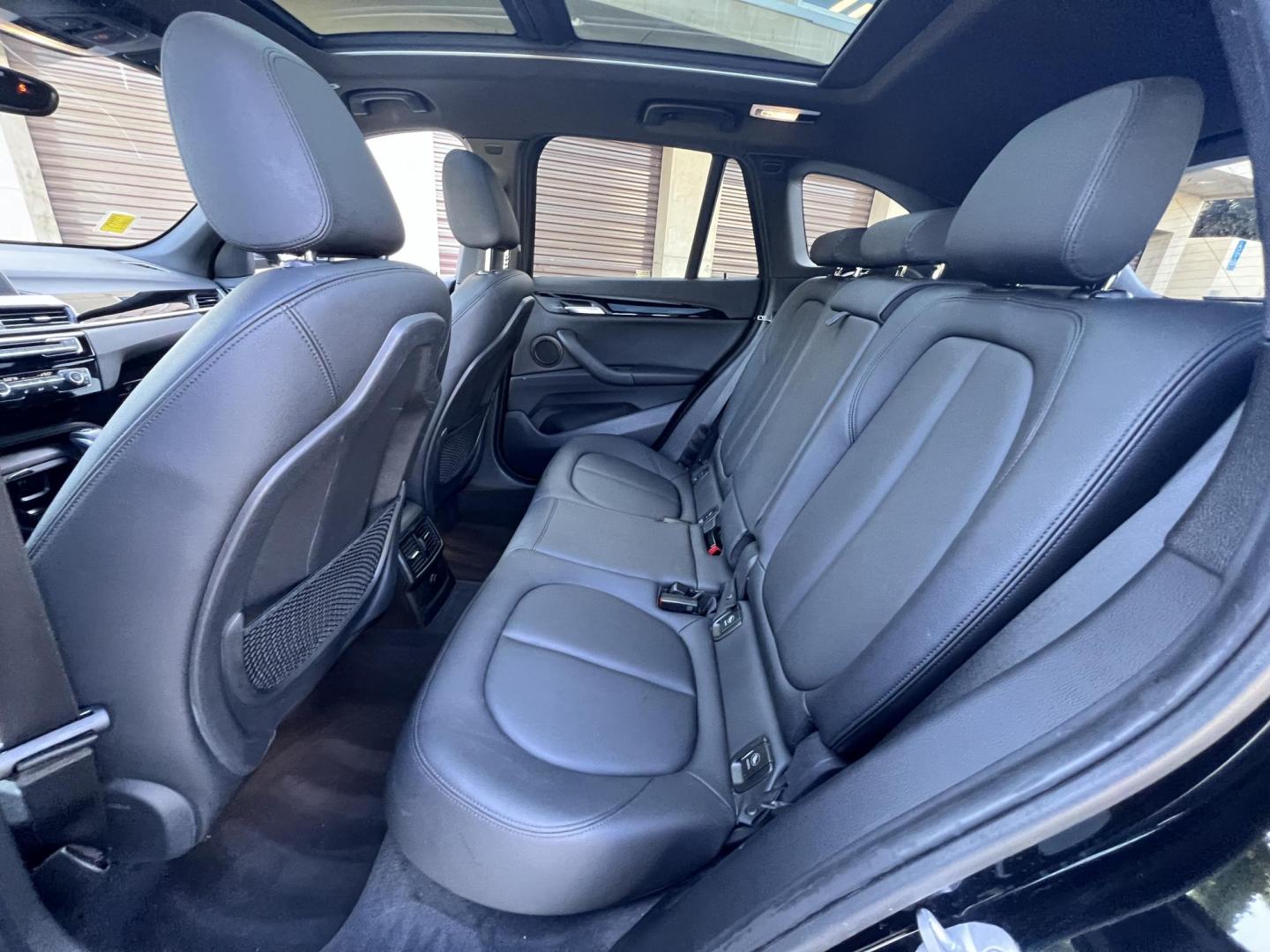 2018 BLACK /Black BMW X1 sDrive28i (WBXHU7C34J5) with an 2.0L L4 DOHC 16V engine, 8A transmission, located at 30 S. Berkeley Avenue, Pasadena, CA, 91107, (626) 248-7567, 34.145447, -118.109398 - 018 BMW X1 sDrive28i – Luxury, Performance and Affordability | Buy Here Pay Here – Pasadena, CA Step into luxury, style, and versatility with this 2018 BMW X1 sDrive28i, available now at Crown City Motors, Pasadena’s trusted Buy Here Pay Here (BHPH) dealership. Whether you're dealing with b - Photo#11